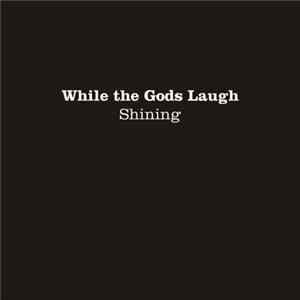While The Gods Laugh - Shining FLAC